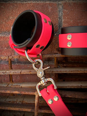 Pink and black biothane bondage wrist restraints 